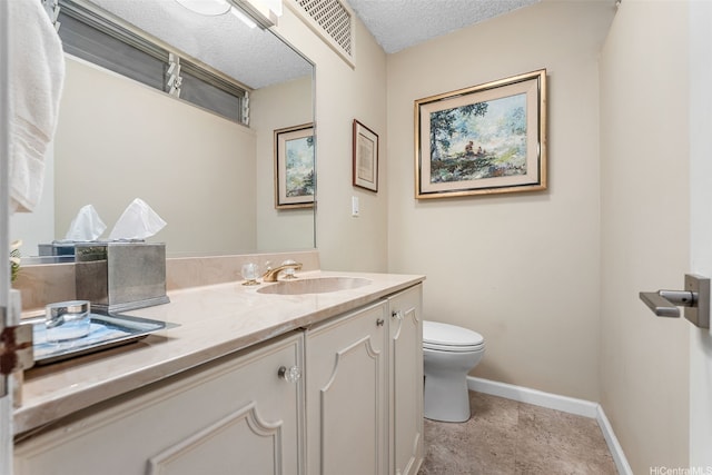 2877 Kalakaua Ave Unit 503/504, Honolulu, HI 96815 - bathroom featuring vanity and a textured ceiling