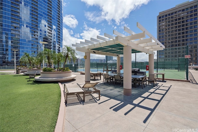 view of patio / terrace with a water view and a pergola