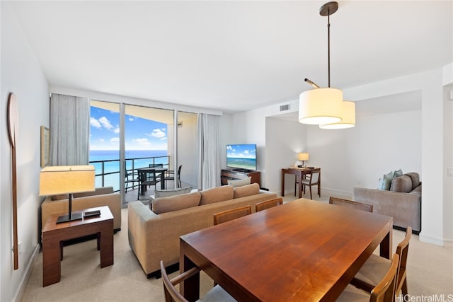 view of carpeted dining space