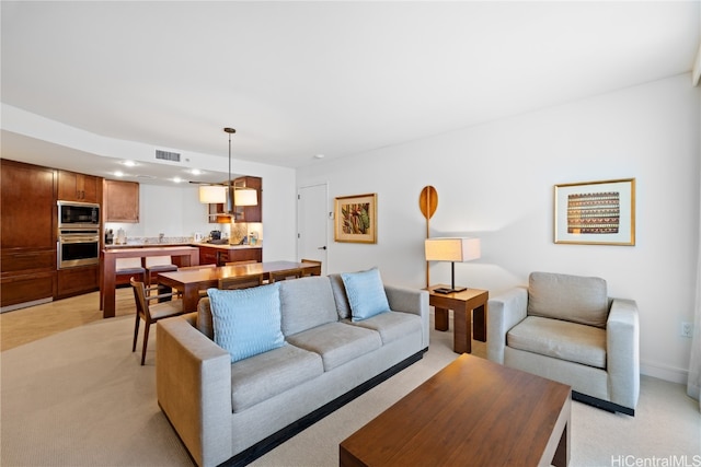 living room with light colored carpet