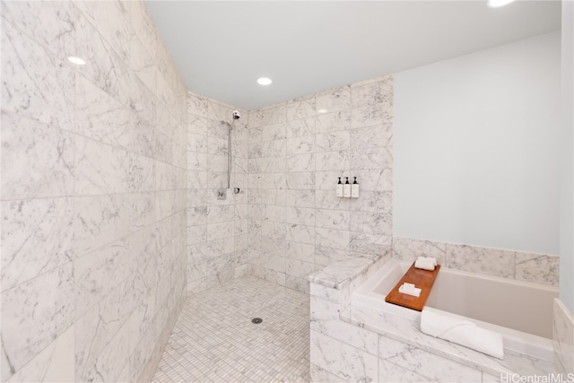 bathroom featuring plus walk in shower