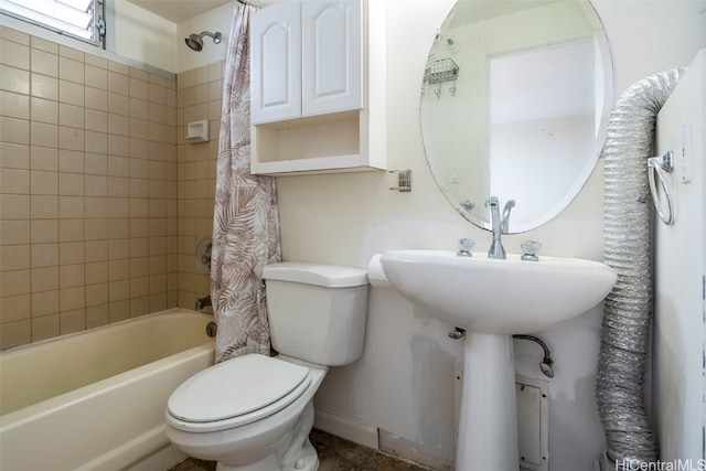 bathroom with toilet and shower / bathtub combination with curtain