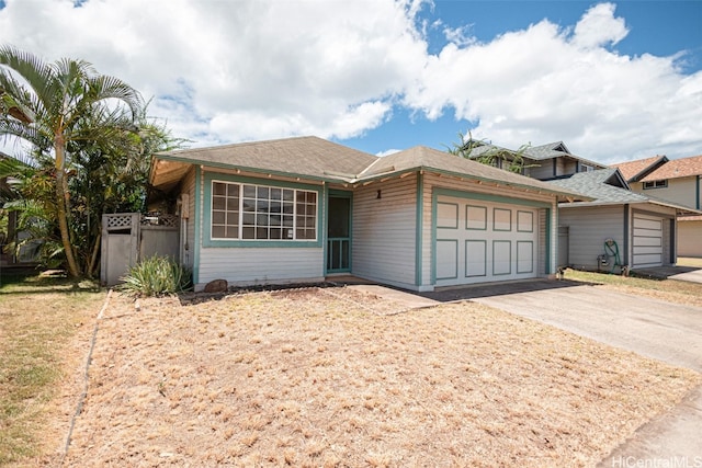 single story home with a garage