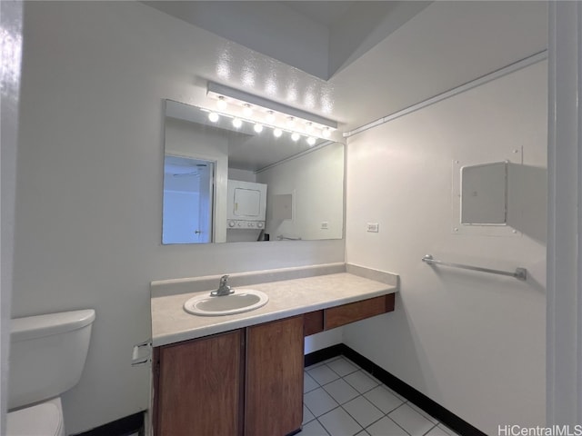 bathroom featuring vanity, toilet, and tile patterned floors