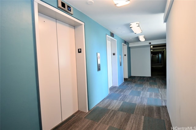 hallway featuring elevator