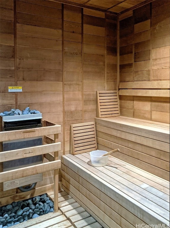 view of sauna / steam room with wooden walls