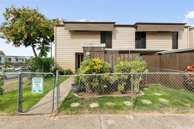 view of front of home with a front yard