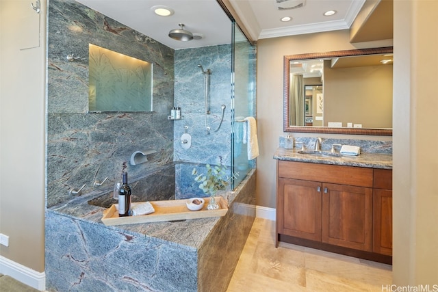 bathroom featuring a tile shower, ornamental molding, and vanity