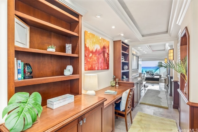 office with ornamental molding and built in desk