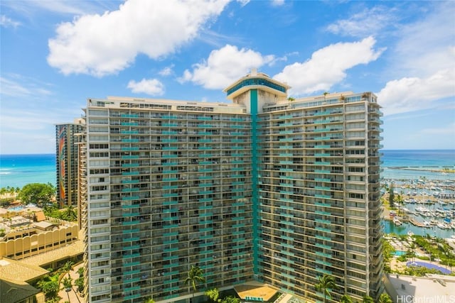 view of building exterior featuring a water view