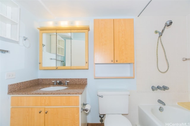 full bathroom with toilet, vanity, and tiled shower / bath combo