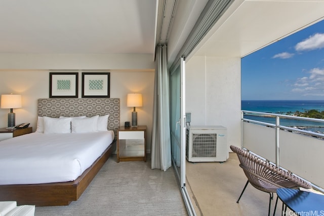 carpeted bedroom featuring a water view