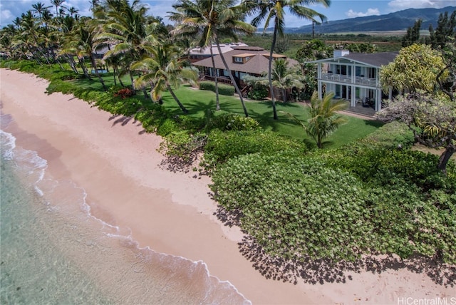 aerial view with a beach view and a water and mountain view