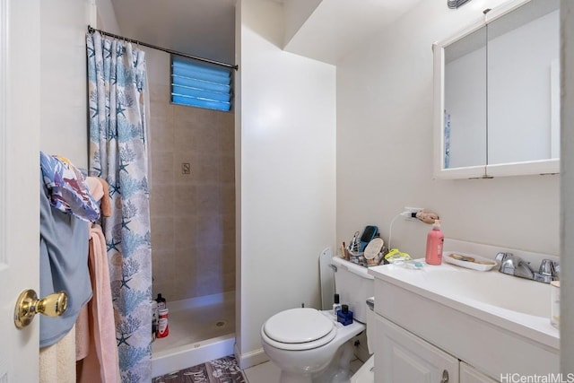 bathroom featuring toilet, vanity, and a shower with shower curtain