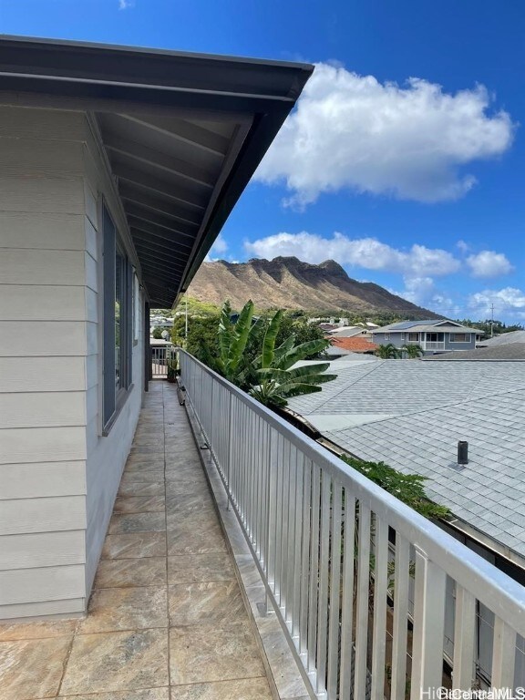 balcony featuring a mountain view