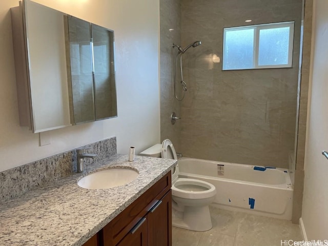 full bathroom with tiled shower / bath, vanity, toilet, and tile patterned flooring