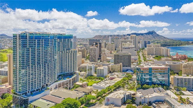 property's view of city featuring a water and mountain view