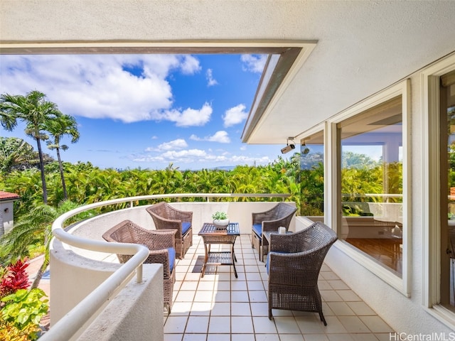 view of patio / terrace with outdoor lounge area and a balcony