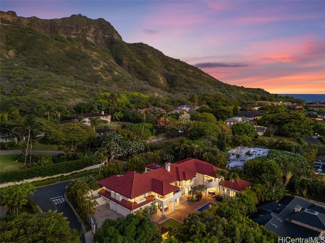 aerial view at dusk with a mountain view