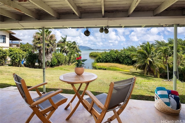 view of patio / terrace featuring a water view