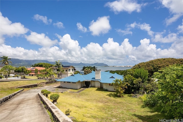 exterior space featuring a mountain view