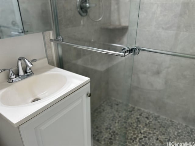 bathroom with vanity and walk in shower