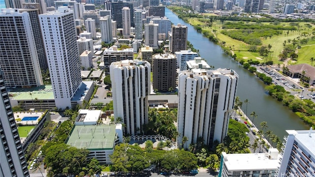 birds eye view of property with a water view