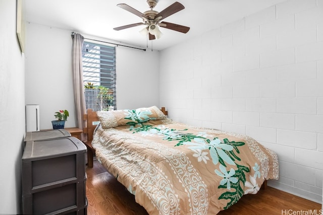 bedroom featuring dark hardwood / wood-style floors and ceiling fan