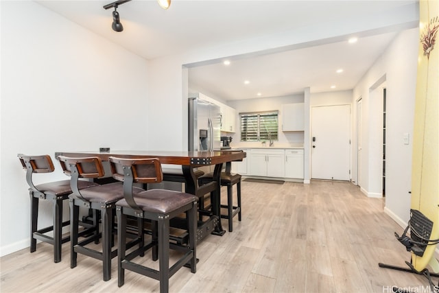 dining area featuring light hardwood / wood-style flooring