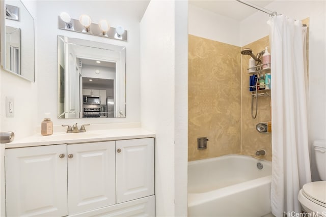 full bathroom featuring vanity, shower / bath combo with shower curtain, and toilet