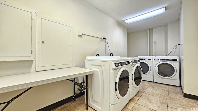 washroom featuring independent washer and dryer