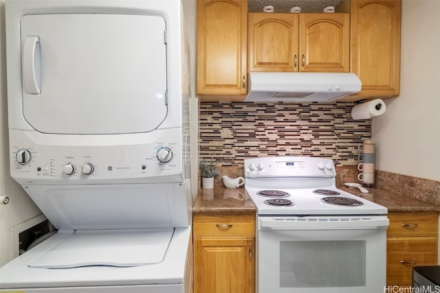 kitchen with stacked washer / drying machine, white range with electric cooktop, and tasteful backsplash