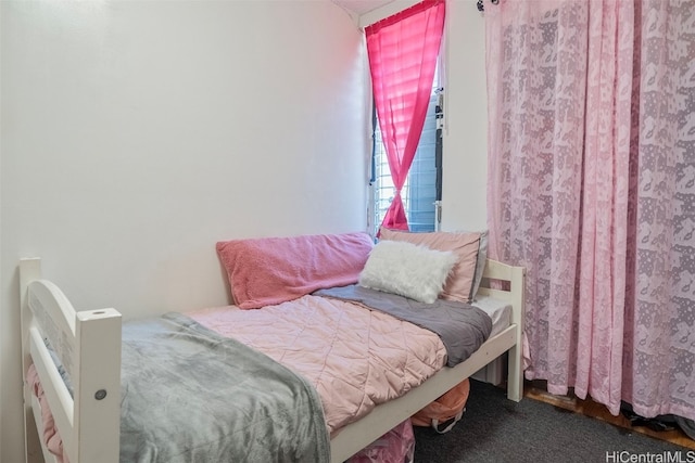 bedroom featuring carpet