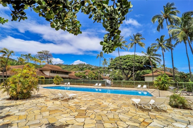 view of pool featuring a patio