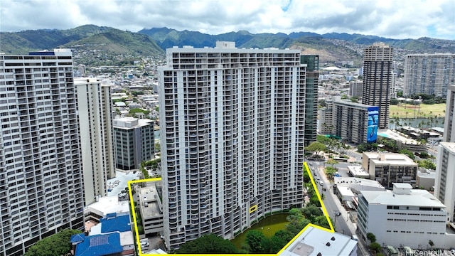 view of building exterior with a mountain view