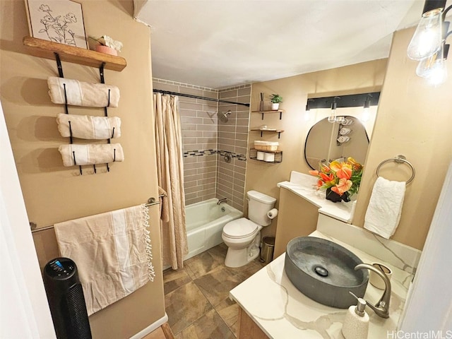 full bathroom with vanity, shower / bath combo with shower curtain, and toilet