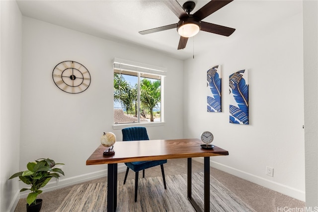 office area featuring carpet flooring and ceiling fan