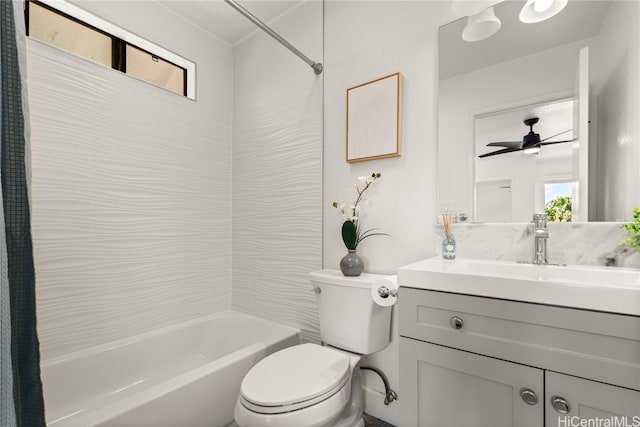 full bathroom featuring vanity, a healthy amount of sunlight, toilet, and shower / bath combination with curtain