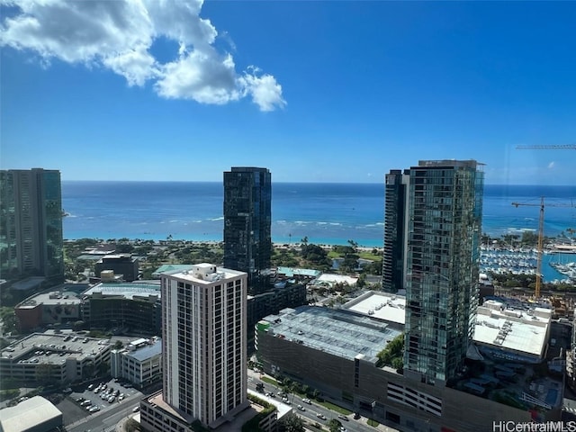 property's view of city featuring a water view