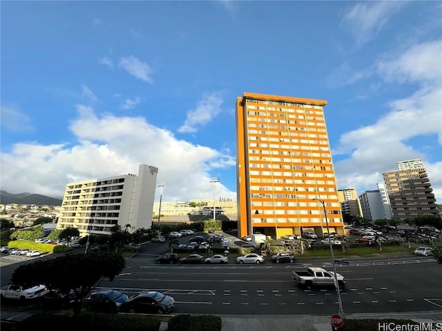 view of building exterior featuring a view of city