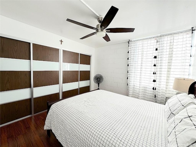 bedroom featuring ceiling fan and wood finished floors