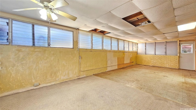 interior space with a ceiling fan