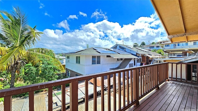 wooden terrace featuring a residential view