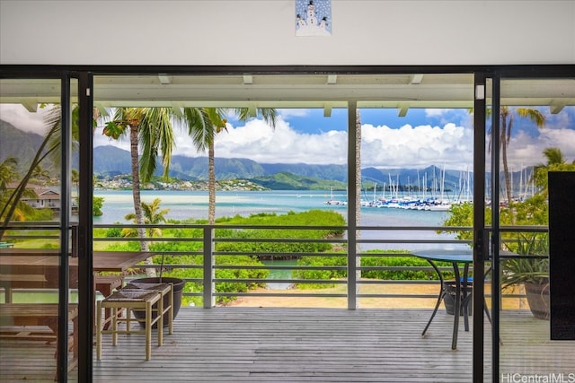 doorway with a water and mountain view