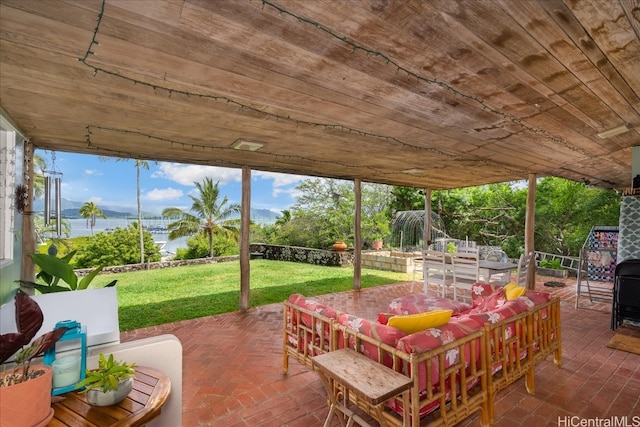 view of patio featuring a water view