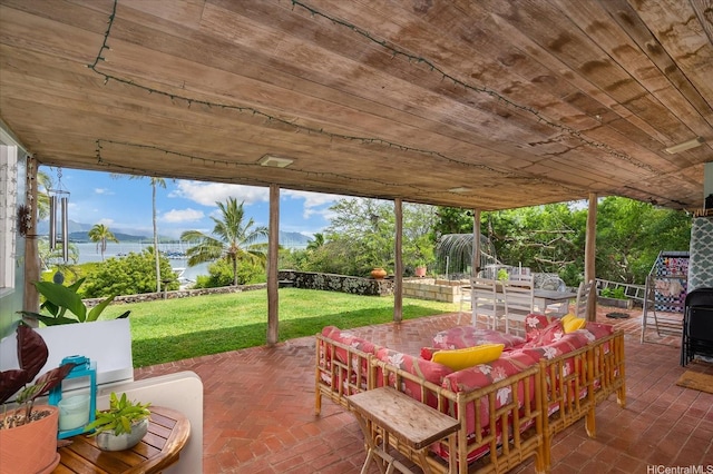 44-519 Kaneohe Bay Dr, Kaneohe, HI 96744 - view of patio featuring a water view and outdoor dining space