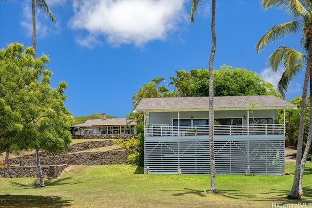 view of home's exterior with a yard