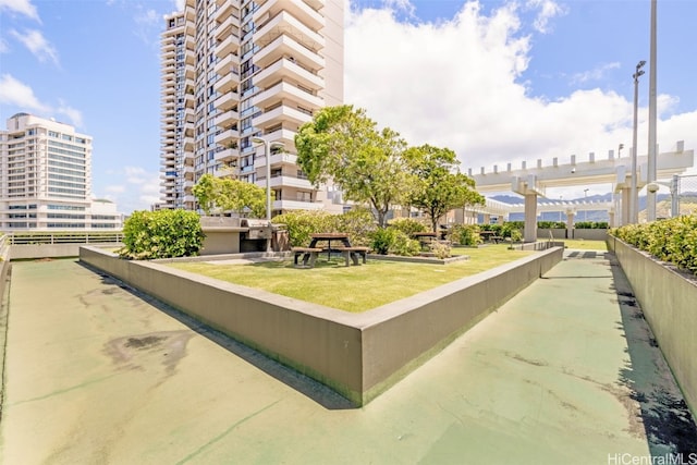 view of home's community featuring a pergola