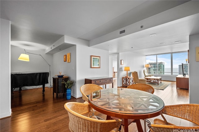 dining area featuring wood-type flooring