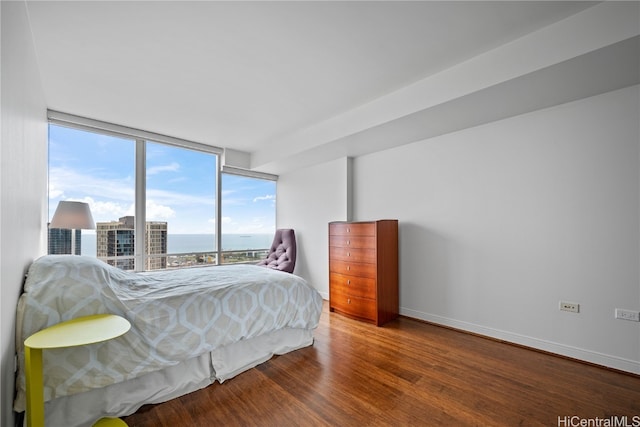 bedroom featuring wood-type flooring